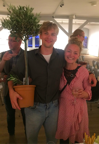 Winners holding an olive tree